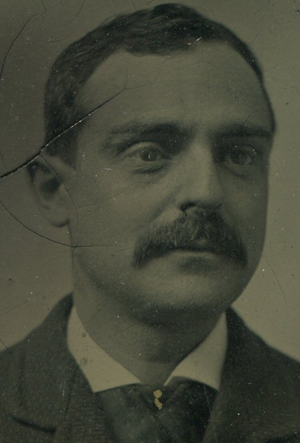 MAN W/ MUSTACHE, LONGING FOR GUMMY BEARS. TINTED TINTYPE, PERIOD PAPER MAT.