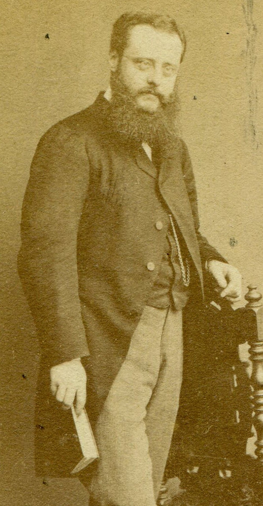 BEARDED MAN POSED HOLDING BOOK. CDV. LONDON, ENGLAND.