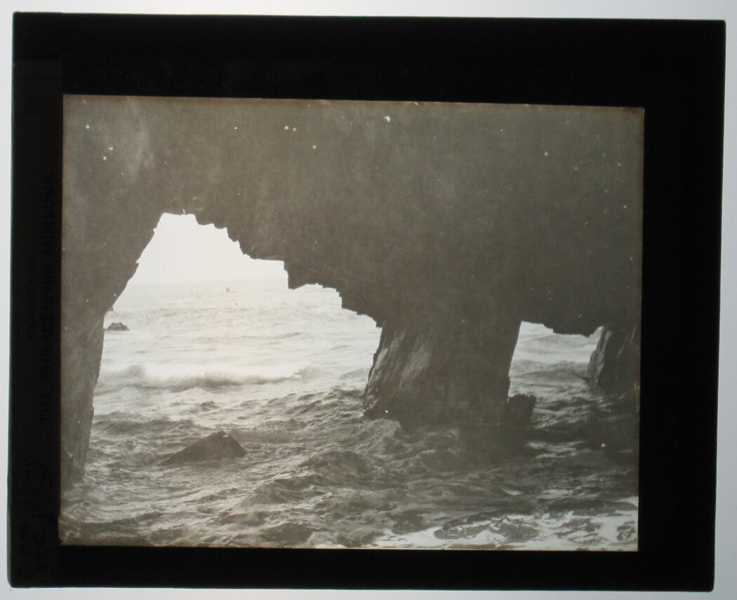 ROCKS CUT AWAY BY WAVES. PERU. PHOTO ON GLASS.