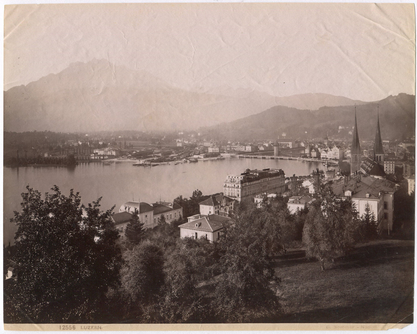 ITALIAN VILLAGE AT THE WATER'S EDGE. UNMOUNTED ALBUMEN.