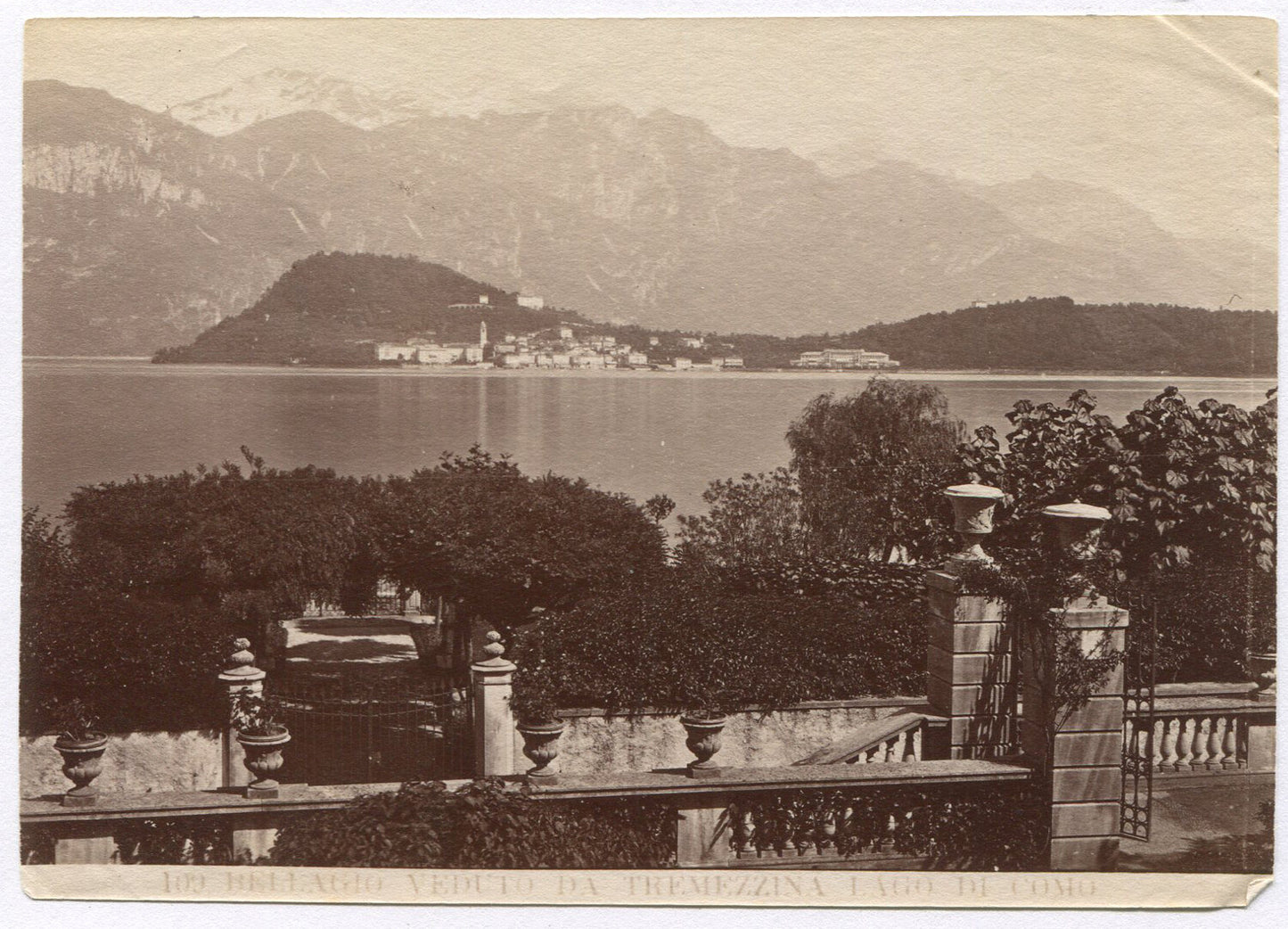 Vintage albumen photo of a European lake with snow-capped mountains, 4x6