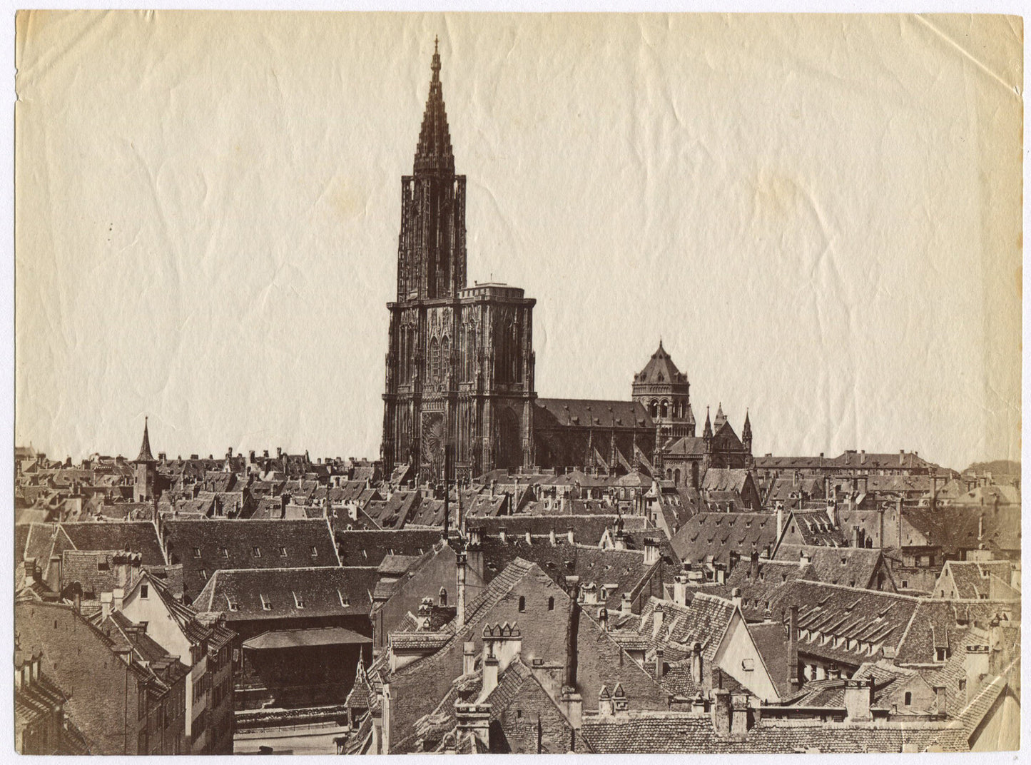 FRENCH CATHEDRAL RISES ABOVE THE ROOFTOPS. UNMOUNTED ALBUMEN.