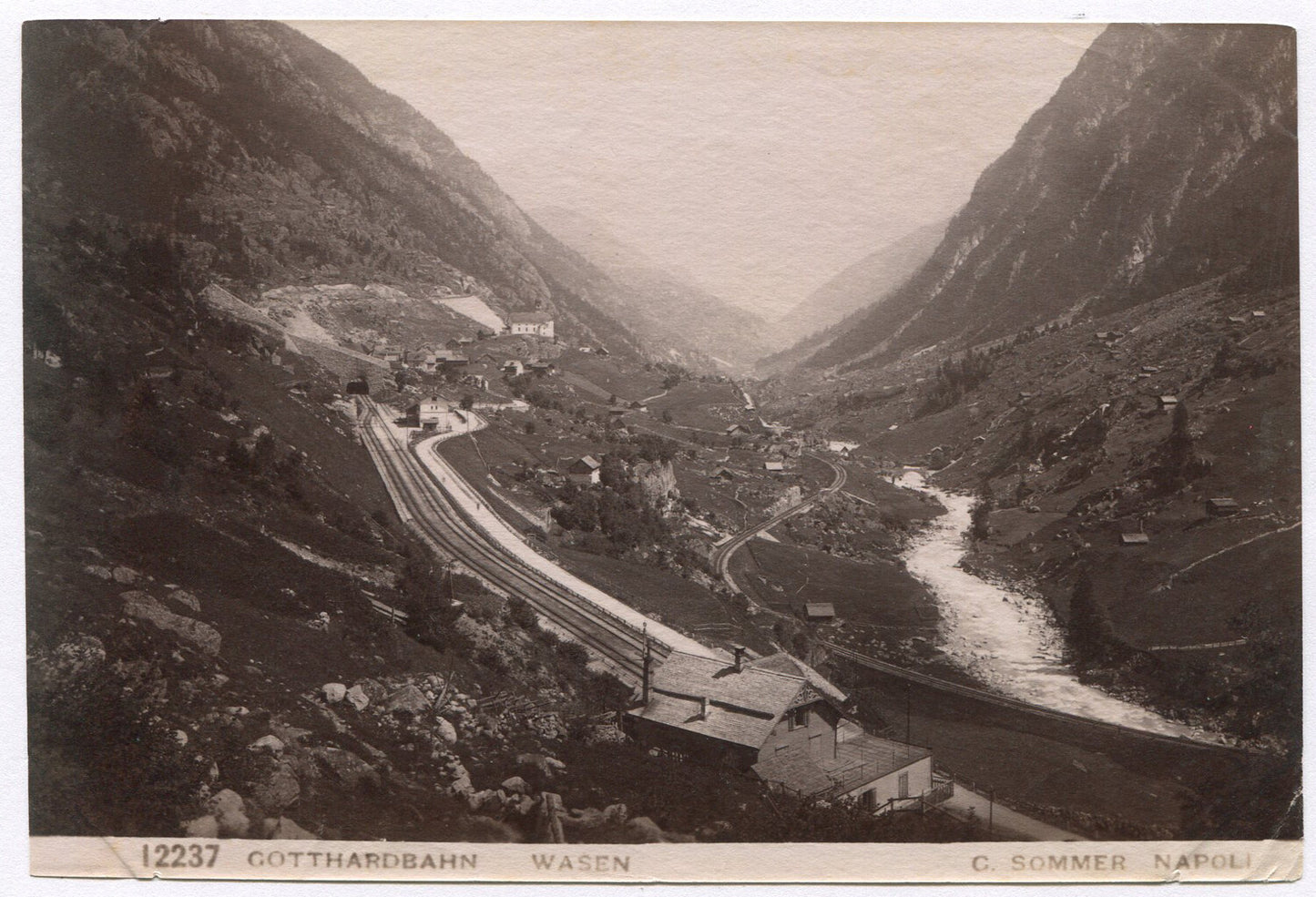 RIVER/ROADS CUT THROUGH MOUNTAINS. UNMOUNTED ALBUMEN.
