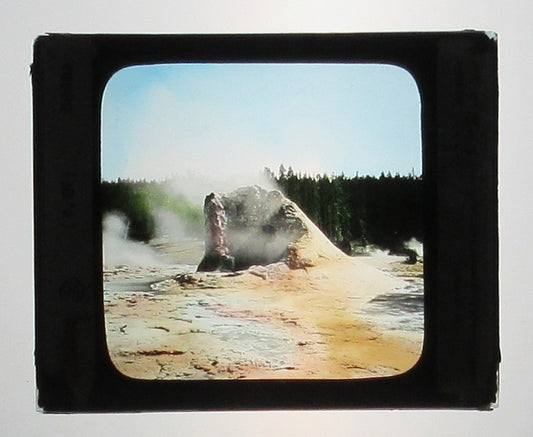 YELLOWSTONE CONE OF GIANT GEYSER. HAND TINTED PHOTO ON GLASS/LANTERN SLIDE