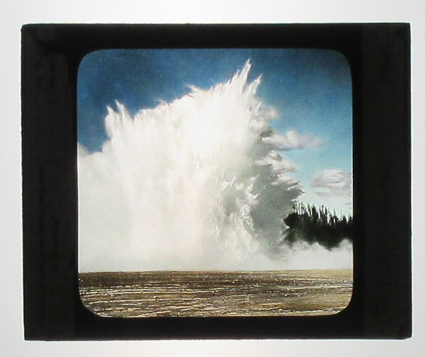 EXCELSIOR GEYSER. HAND COLORED PHOTO ON GLASS.