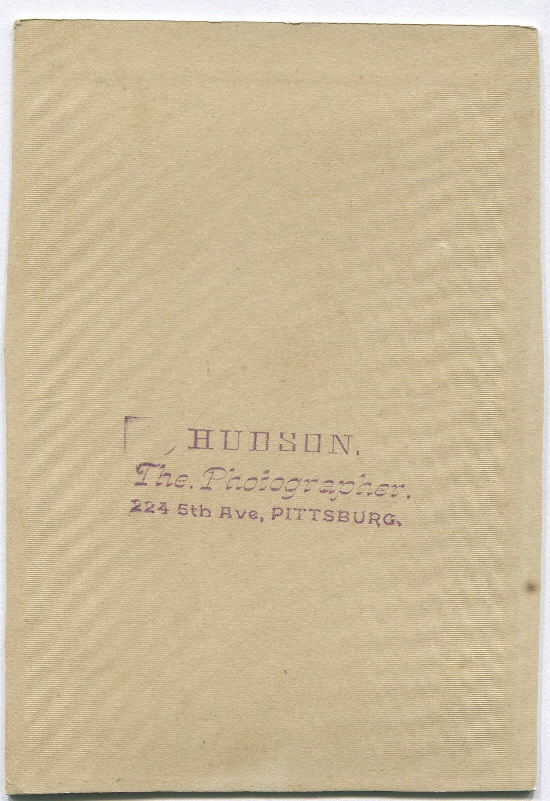 SQUARE JAWED MAN. 1920s PHOTO ON TRIMMED CARD.