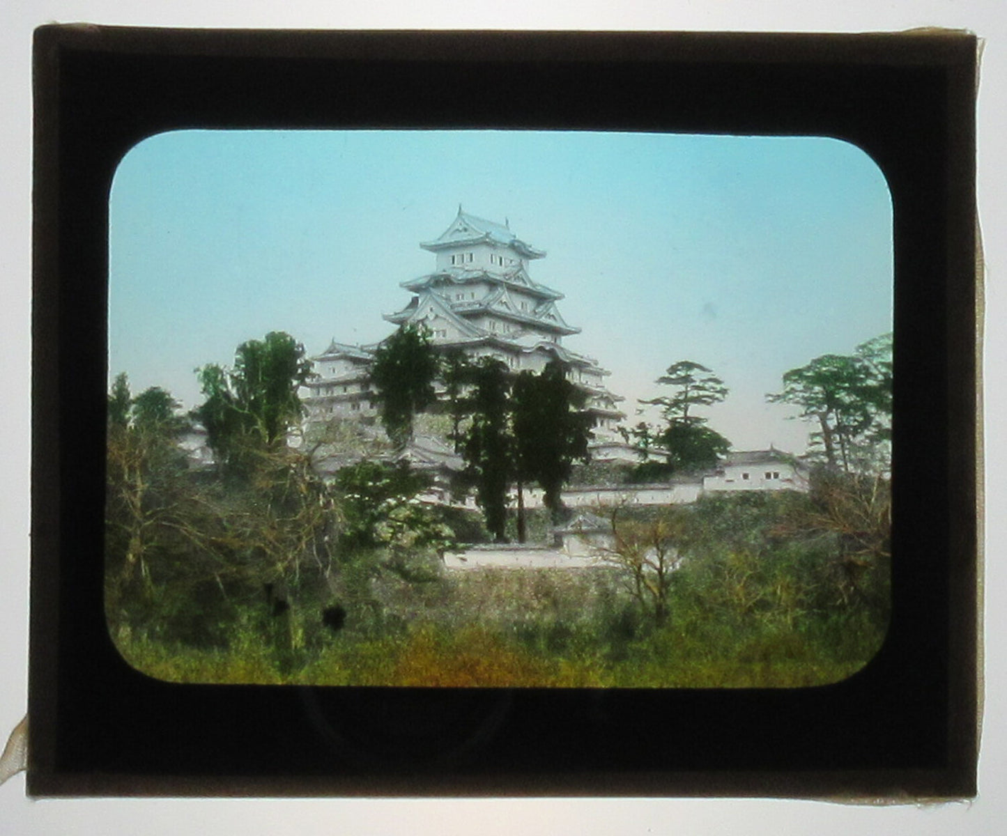 LARGE TRADITIONAL JAPANESE ARCHITECTURE. HAND COLORED PHOTO ON GLASS.