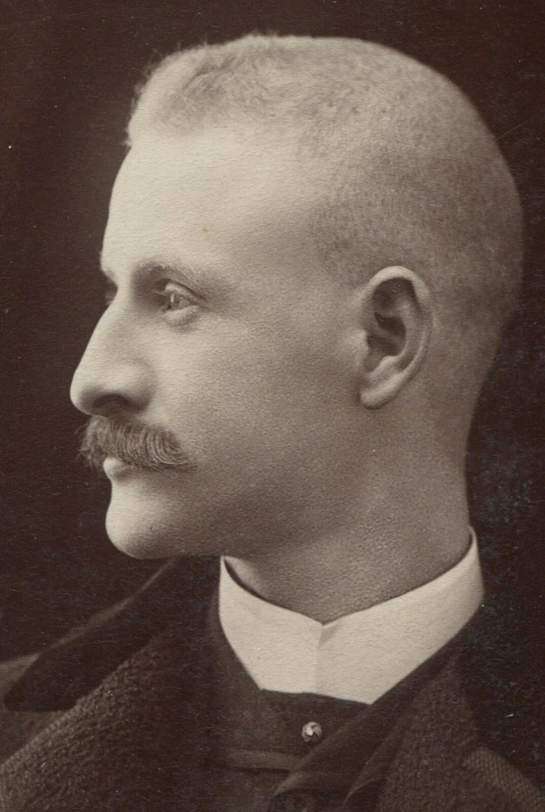 HANDSOME MAN W/MUSTACHE IN PROFILE. UNIQUE POSE. CABINET CARD.