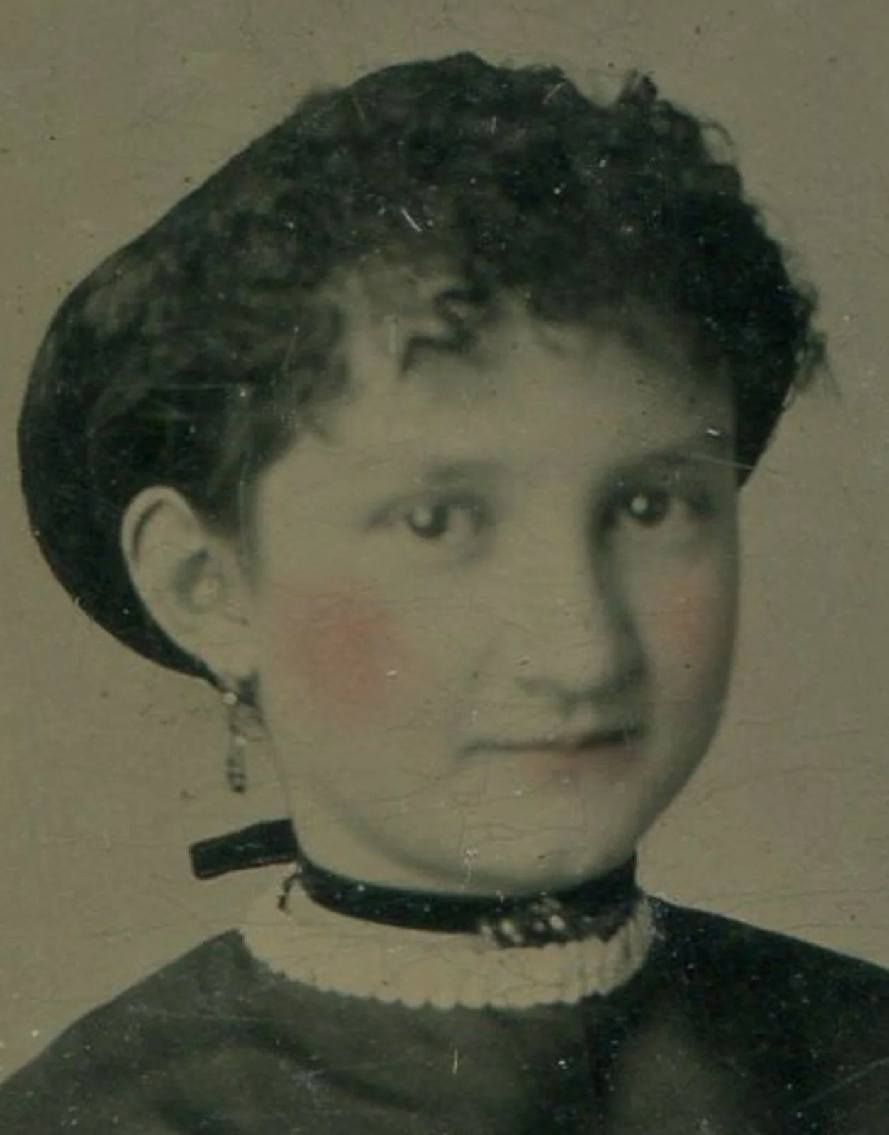 SMILING, CURLY HAIRED GIRL. TINTED TINTYPE, PERIOD PAPER MAT.