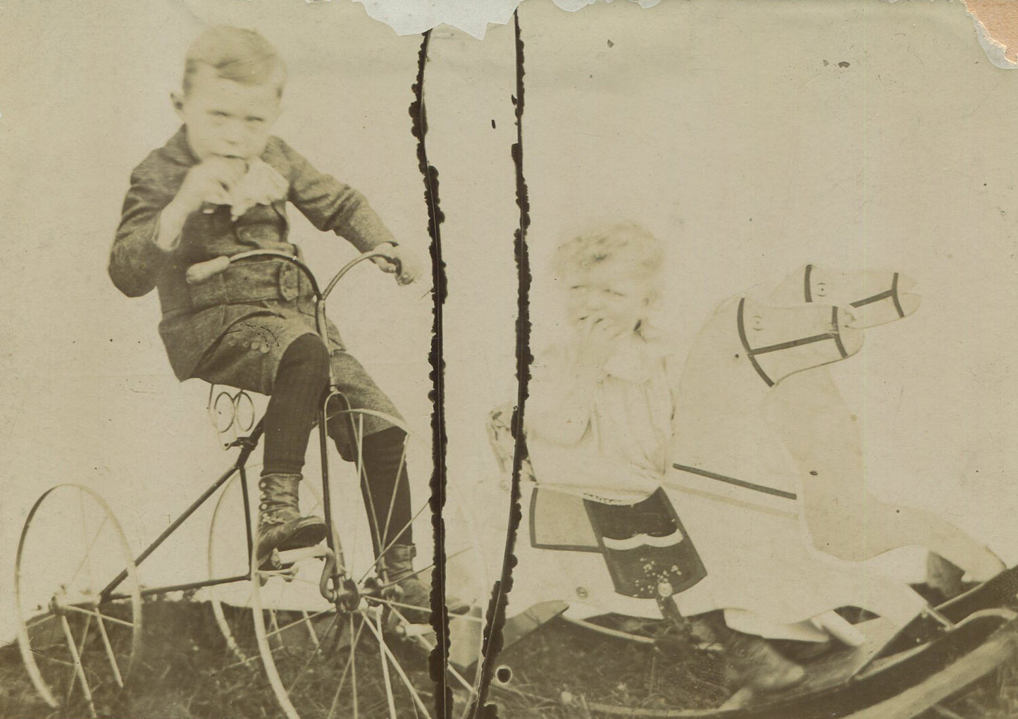 CHILDREN W/ TRICYCLE AND DOUBLE ROCKING HORSE. CABINET CARD.