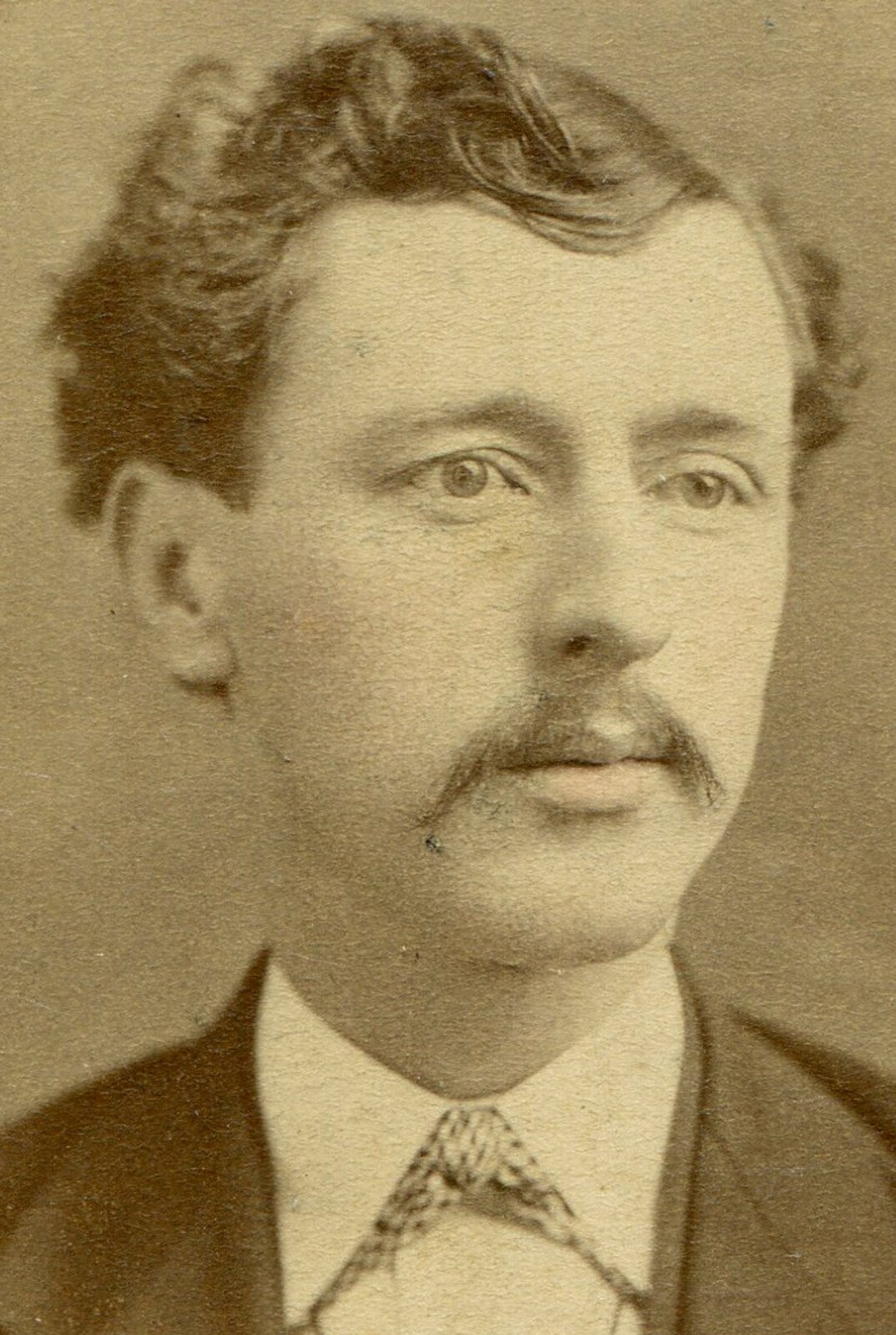 MAN W/WAVY HAIR AND MUSTACHE. CDV. PETERSBURG, VA.