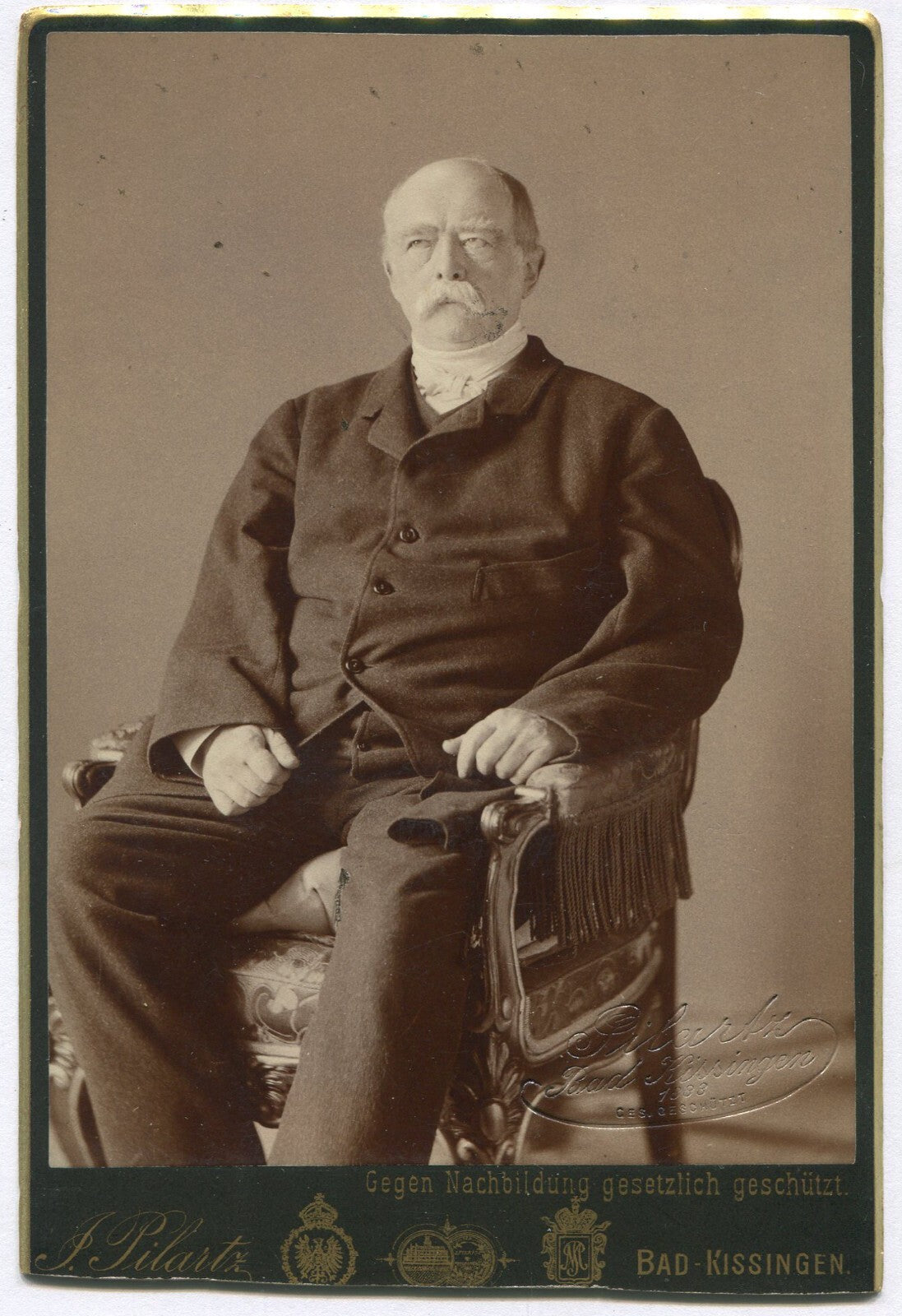 OLDER MAN W/MUSTACHE, SEATED POSE. I.D. ON CARD BACK. CABINET CARD, GERMANY.