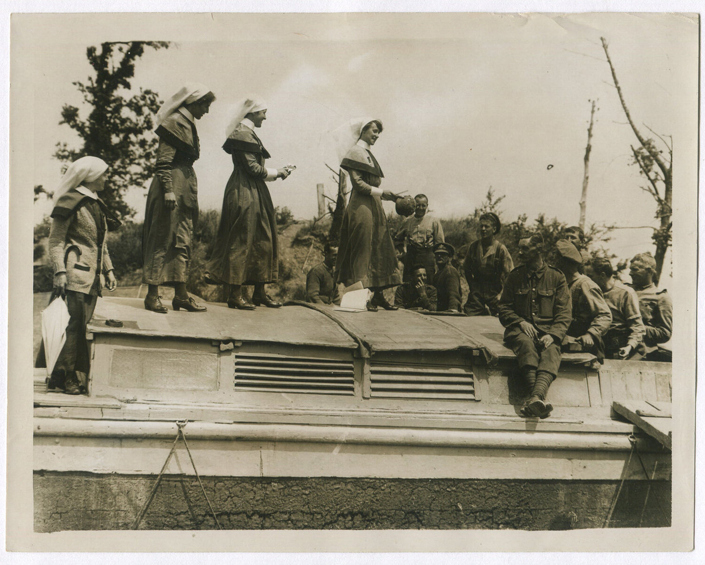 Vintage 8x10 WWI Photo Reprint: Auction on Red Cross Boat with German Helmet,