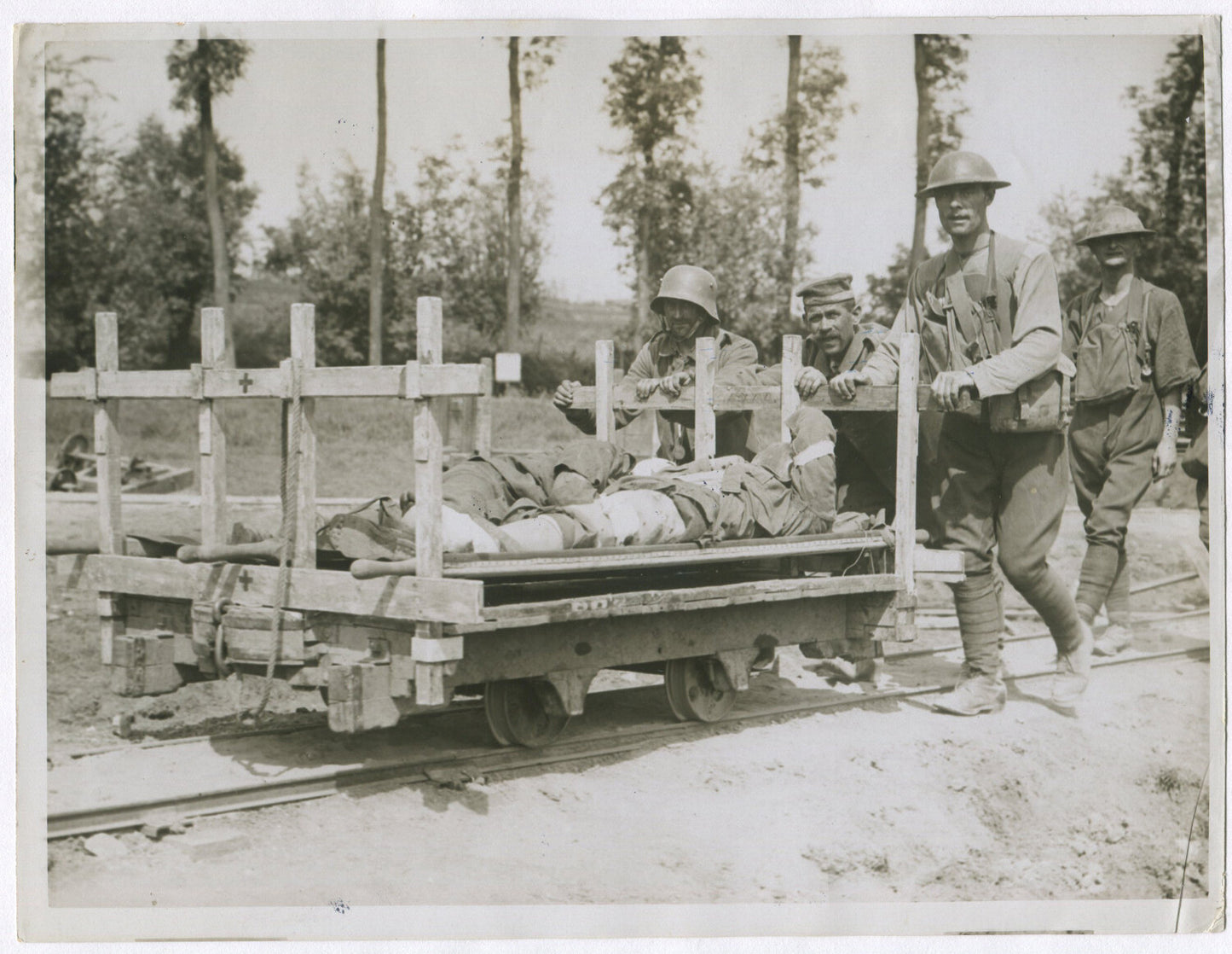 Vintage World War I photo 8x10 print: German prisoners helping British wounded