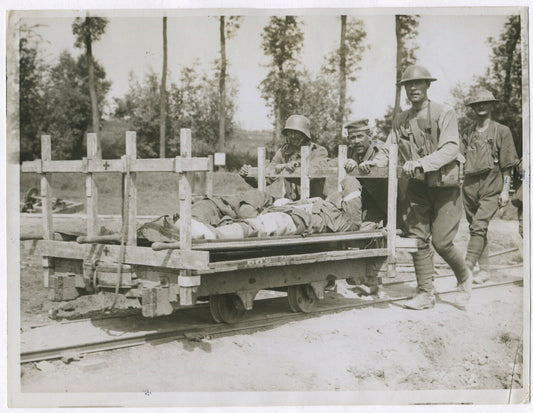 Vintage World War I photo 8x10 print: German prisoners helping British wounded