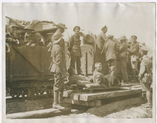 WOUNDED BEING SENT TO HOSPITAL ON LIGHT RAIL. WWI. (8X10 REPRINT)
