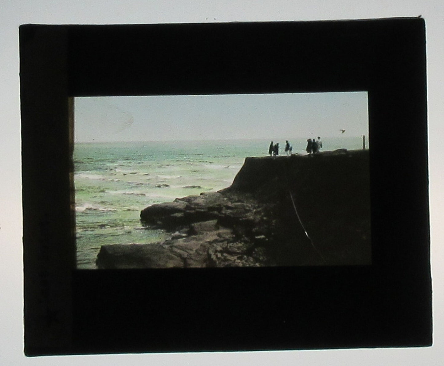 FAMILY VISIT LAST POINT BEACH. HAND COLORED PHOTO ON GLASS.