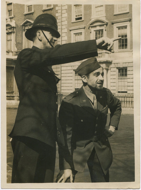 Vintage WWII 8x10 photo reproduction: British police directs a US serviceman to