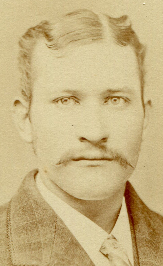 MAN W/MUSTACHE, PLAID SUIT. CDV. MT. PLEASANT, IOWA.
