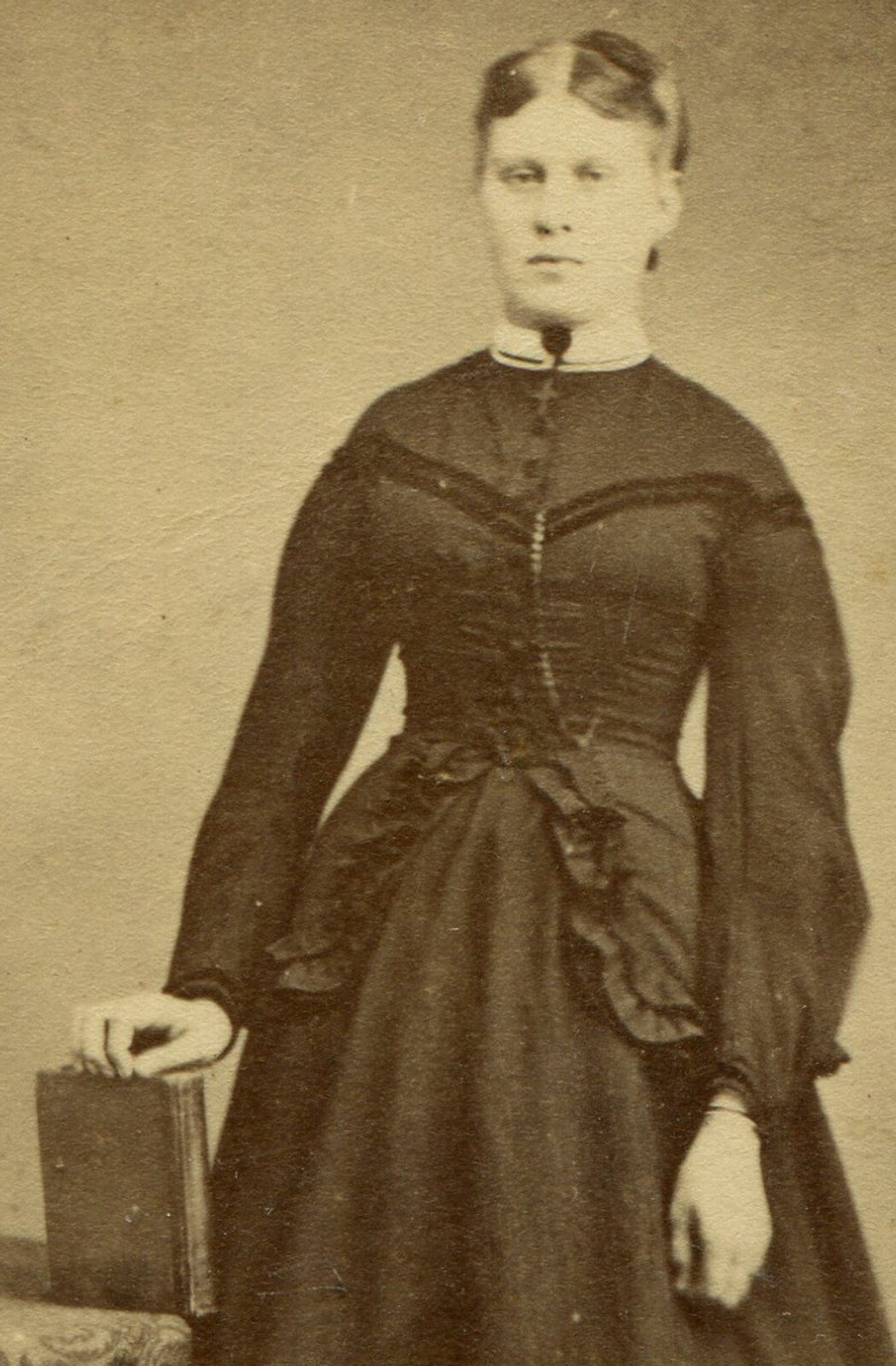 WOMAN STANDING POSE AT TABLE W/BOOK IN HAND. CDV. SELINSGROVE, PA.
