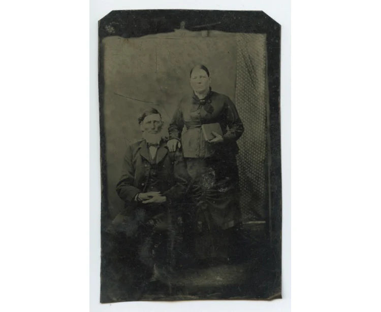 TINTYPE STUDIO PORTRAIT OF MAN W/ GREAT CHIN WHISKERS   WIFE W/ BOOK