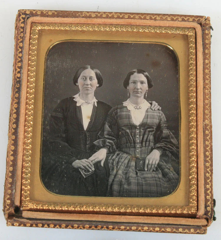 DAGUERREOTYPE TWO WOMAN AFFECTIONATE POSE, BOTH HOLD  DAG CASE. TINTED, UNIQUE.
