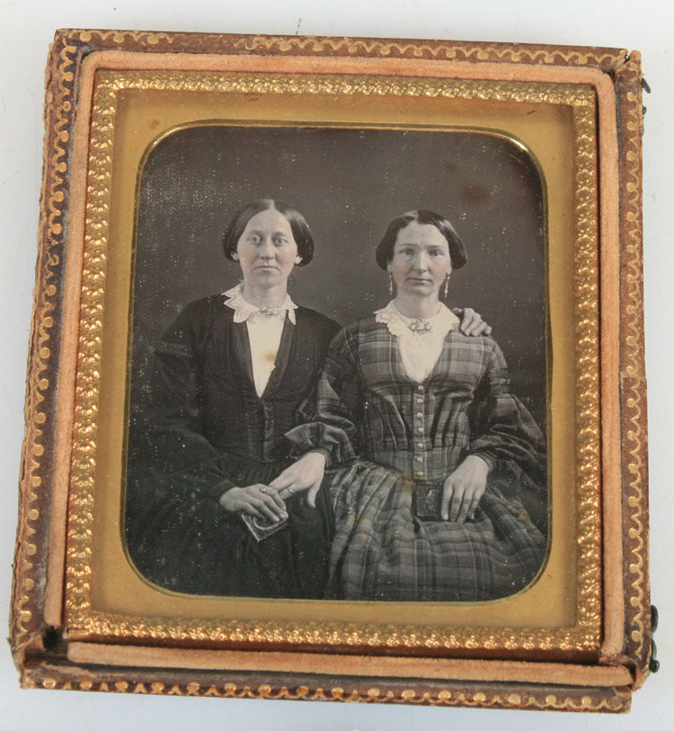 DAGUERREOTYPE TWO WOMAN AFFECTIONATE POSE, BOTH HOLD  DAG CASE. TINTED, UNIQUE.