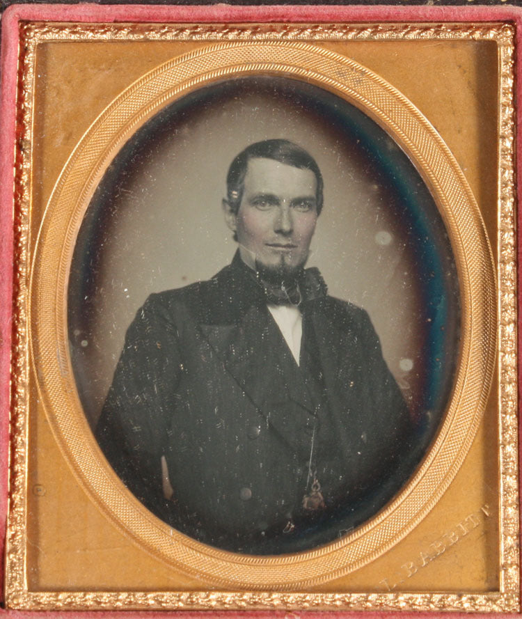 DAGUERREOTYPE HANDSOME MAN, TINTED. 1/6TH PLATE FULL CASE, MAKER MARK BABBITT.