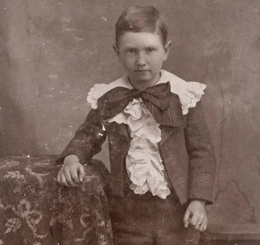 Vintage Cabinet Card of Boy Dressed In Ruffled Shirt and Big Bow//Victorian Cabinet Card