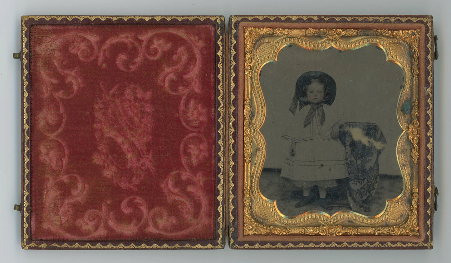 LITTLE GIRL W/ HAT AMBROTYPE