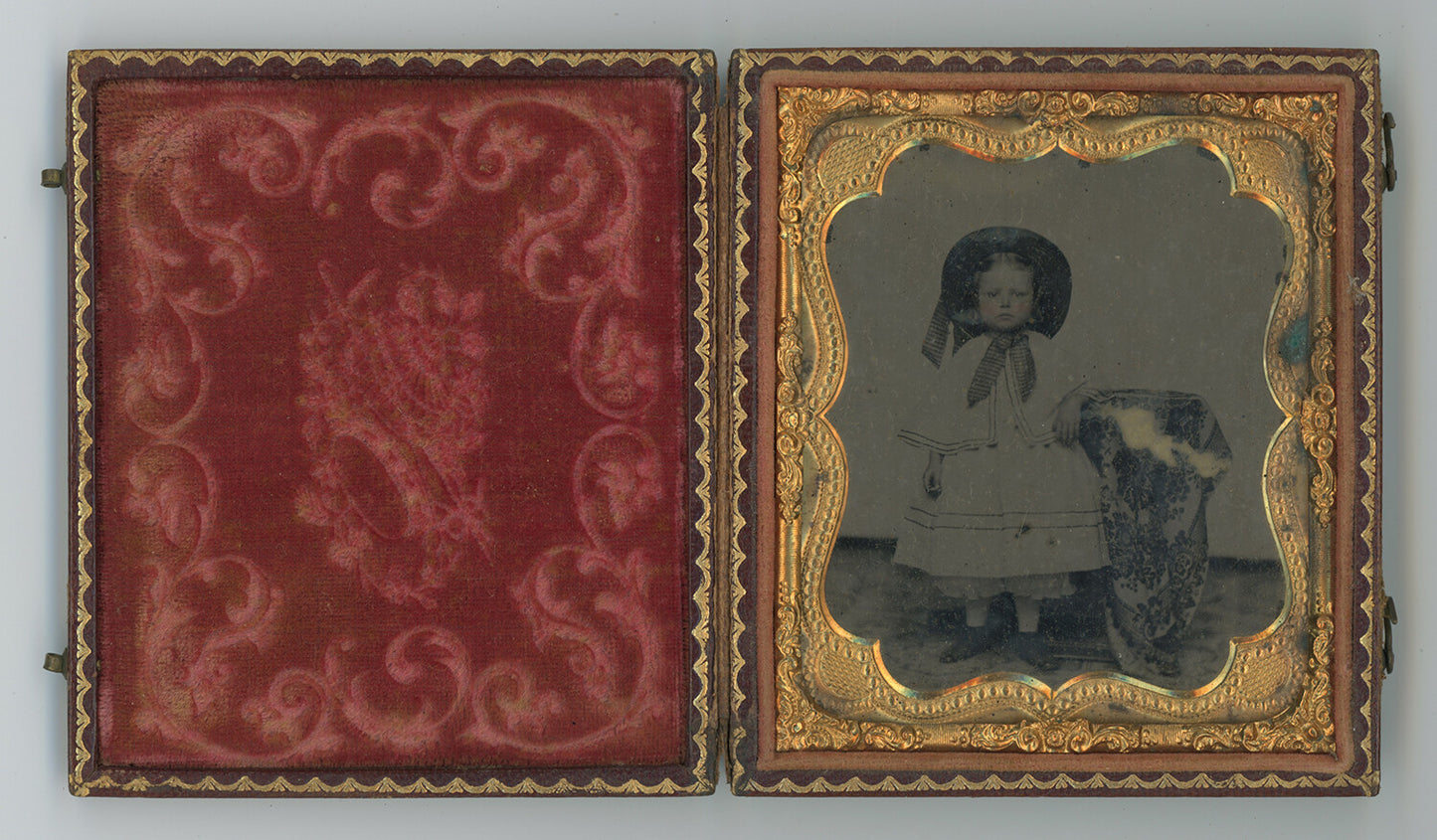 LITTLE GIRL W/ HAT AMBROTYPE