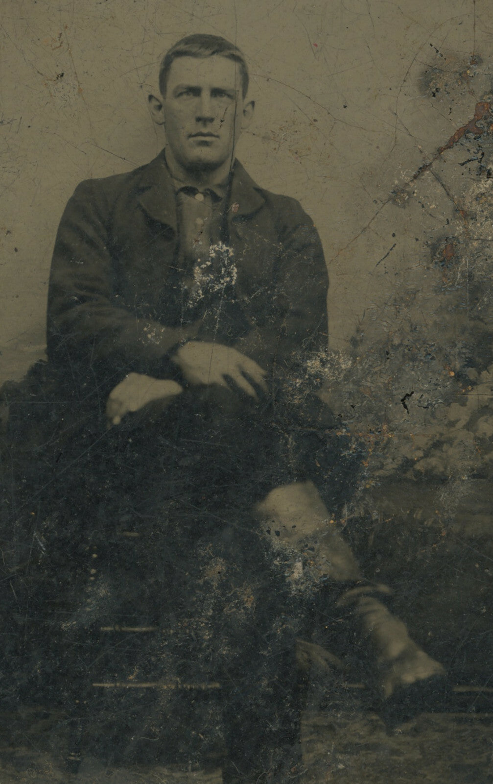 WESTERN 1/6 PLATE TINTYPE, MAN W/ BOOTS?