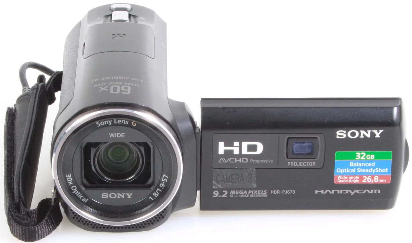 Sony Handycam w/ Built in Projector, Batteries, Cords, Case