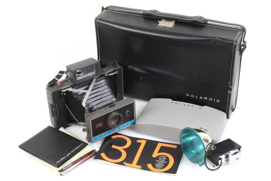 Vintage Polaroid Camera w/ Case & Accessories