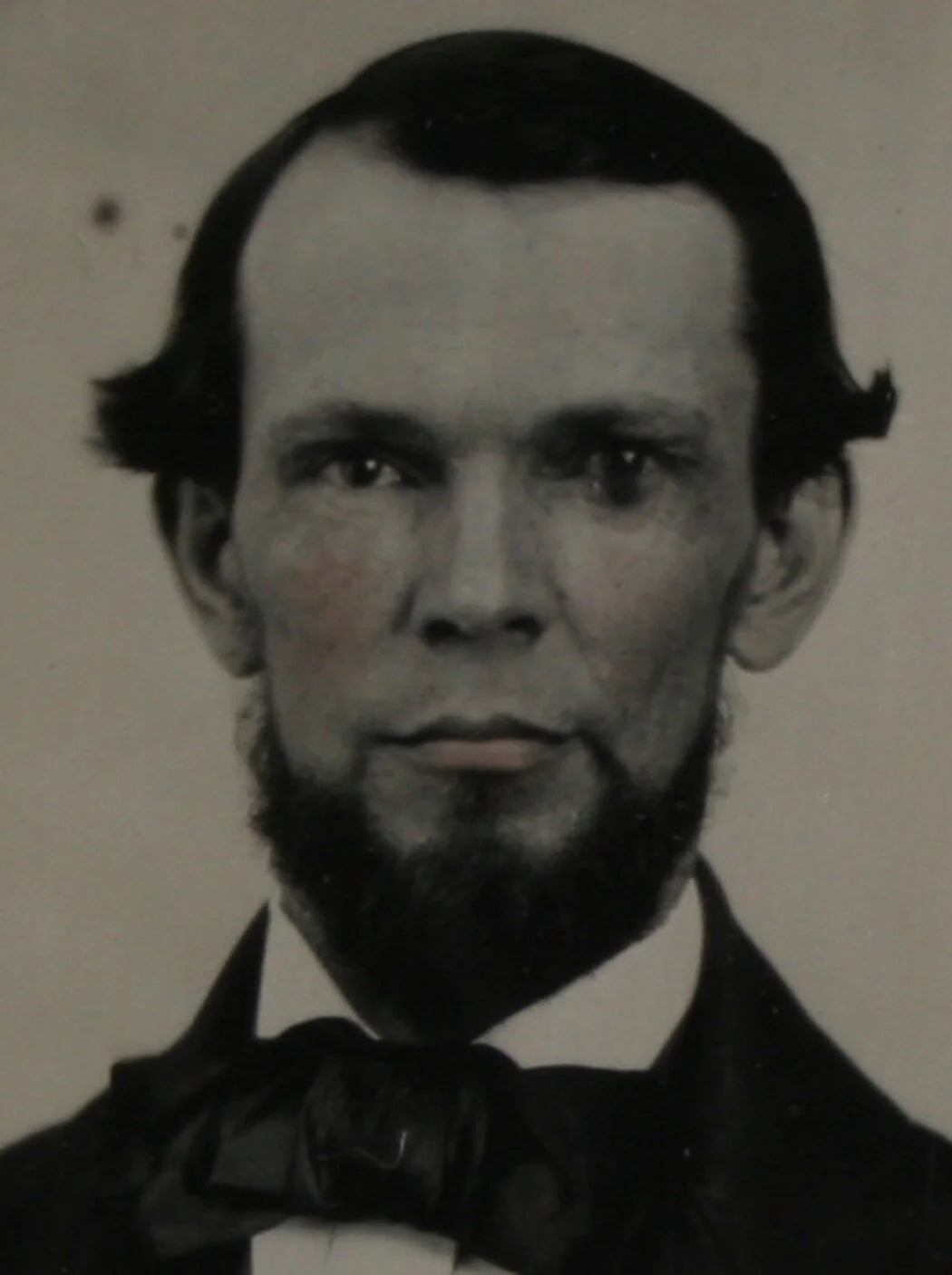 BEARDED MAN, DATED JULY 20, 1859, AMBROTYPE. TINTED, CRISP 6TH PLATE, FULL CASE