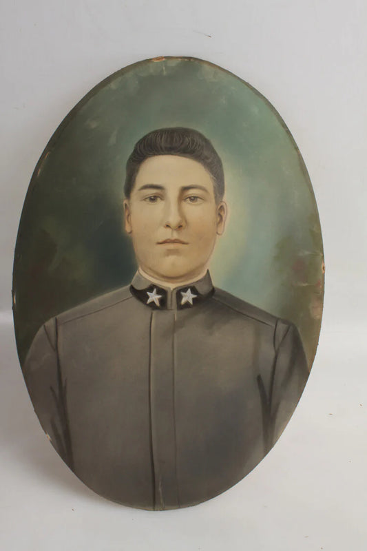 13X19 CONVEX PORTRAIT OF HAND COLORED YOUNG MAN IN UNIFORM