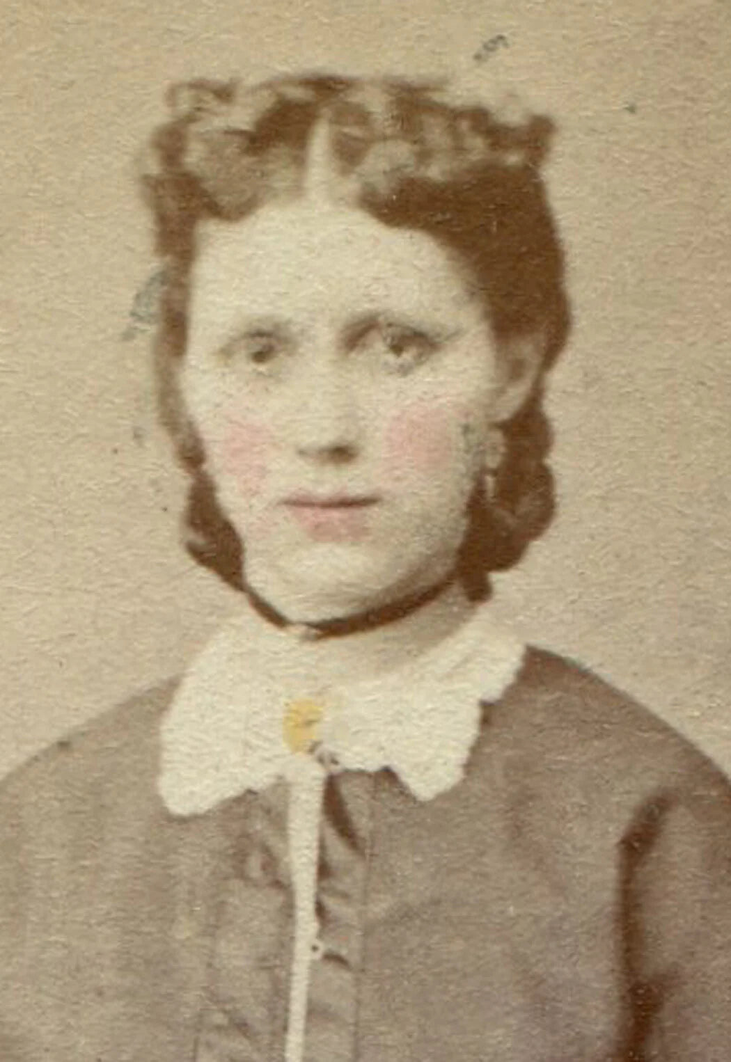 WOMAN IN SATIN TRIMMED SKIRT AND JACKET. TINTED CDV.