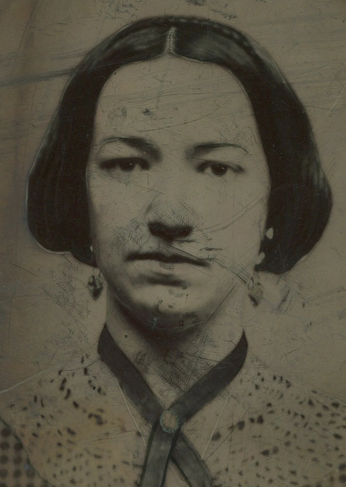 WOMAN IN CHECKERED DRESS, RIBBON NECKLACE, AND EARRINGS. TINTYPE 8.5X7 IN.