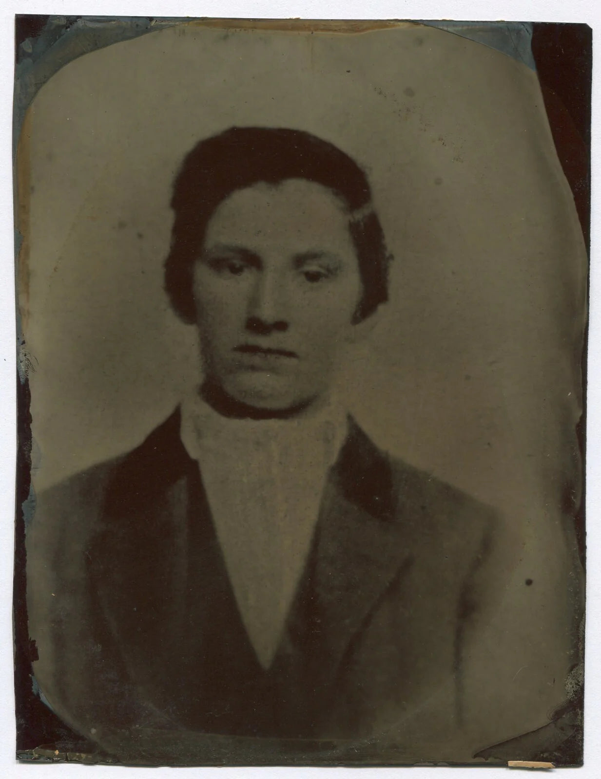 YOUNG MAN, SAD BLANK STARE. TINTYPE 8.5X6.5 IN.