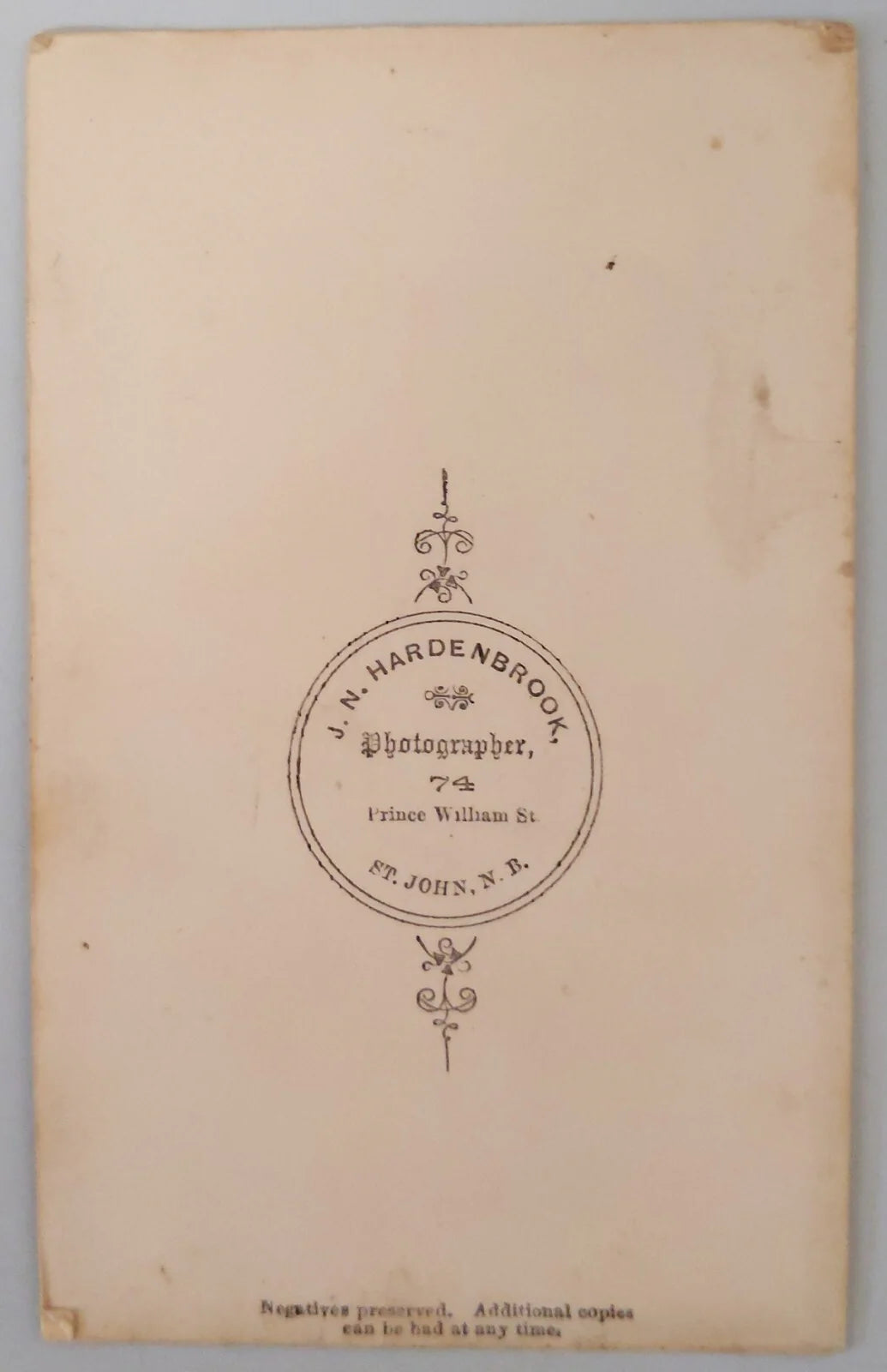 CDV PORTRAIT OF OLDER WOMAN POSING WITH BOOKS - J.N. HARDENBROOK PHOTOGRAPHER