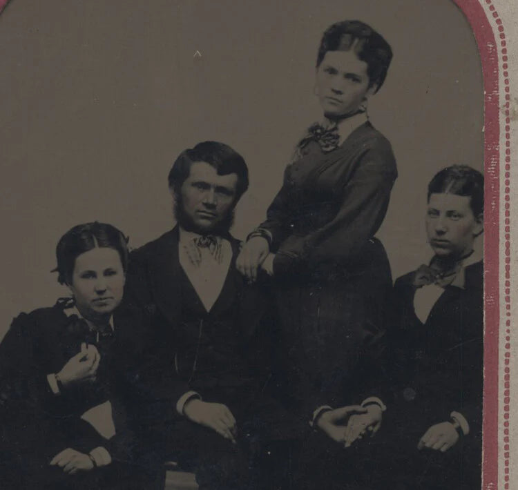 PORTRAIT OF WELL-DRESSED MAN W/ WIFE AND TWO DAUGHTERS