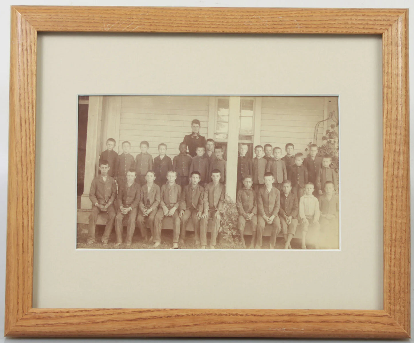 BOYS SCHOOL CLASS PHOTO IN FRONT OF SCHOOL. 8X10 FRAME, ARCHIVAL MATTING.
