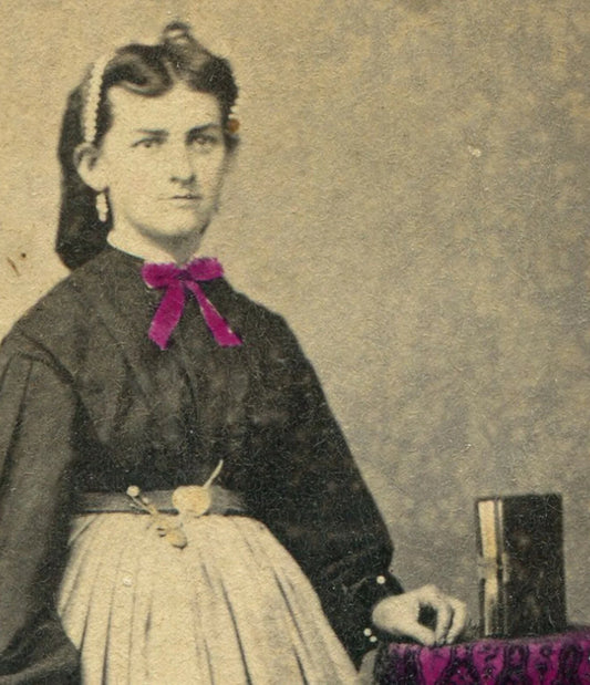 WOMAN W/TINTED BOW TIE, STANDING POSE W/BOOK. CDV. PHOENIXVILLE,PA.