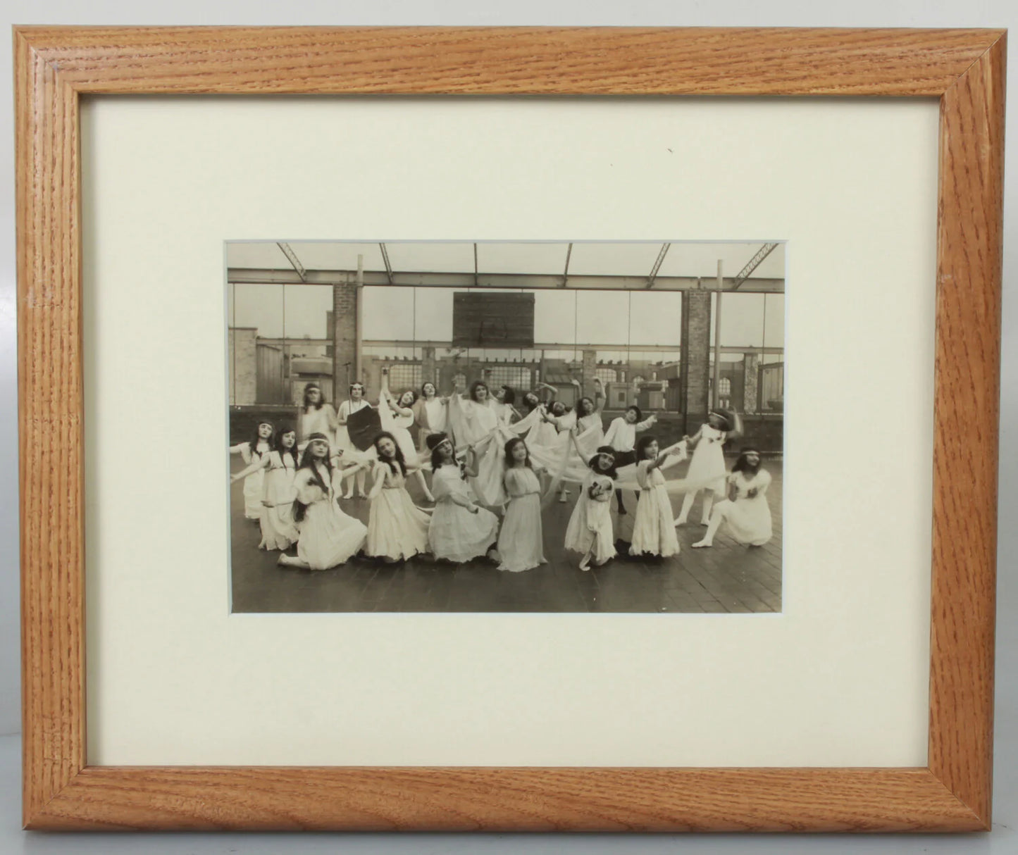 YOUNG WOMEN AND GIRLS DANCE ON ROOFTOP. 4X6.5 SILVER PRINT IN 8X10 FRAME.