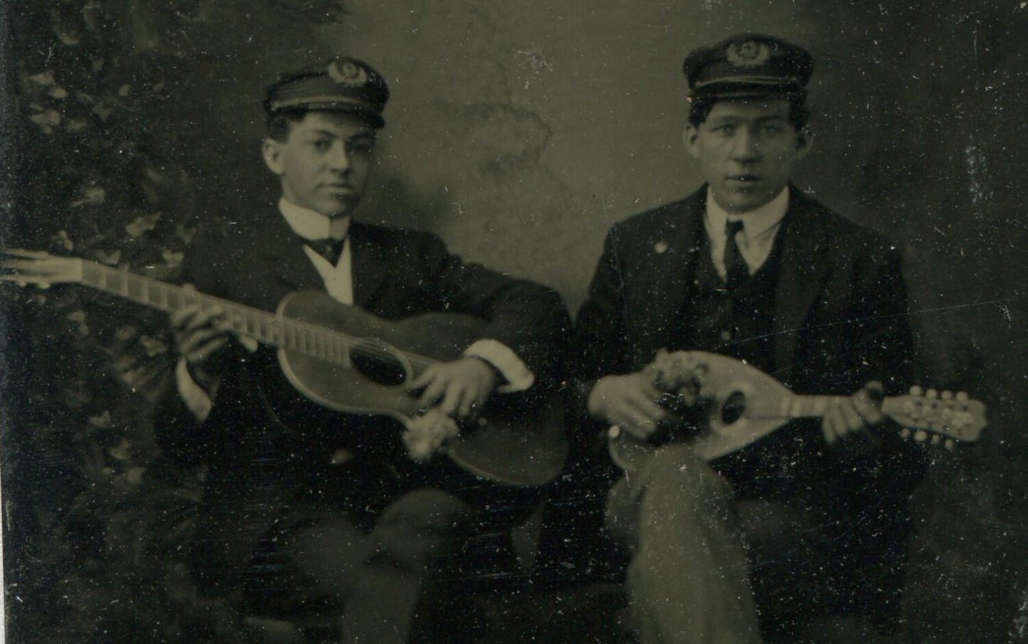 FIREMEN POSED W/MUSICAL INSTRUMENTS. TINTYPE.