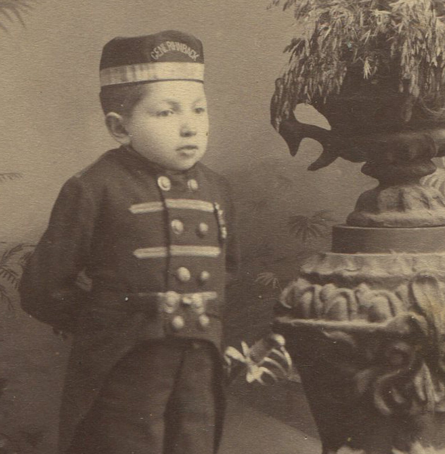 LITTLE PERSON, YOUNG MAN IN UNIFORM. PAINTED BACKGROUND CABINET CARD.
