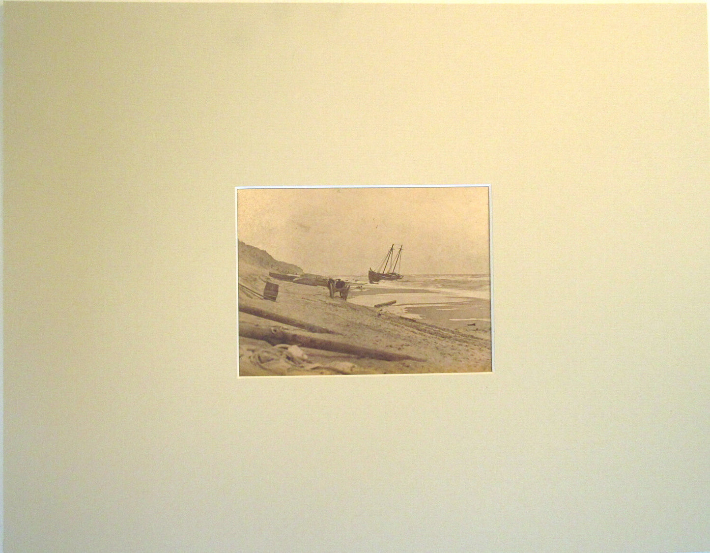 SHIP ON BEACH. CABINET CARD BY NICKELSON, 11X14 ARCHIVAL MAT.