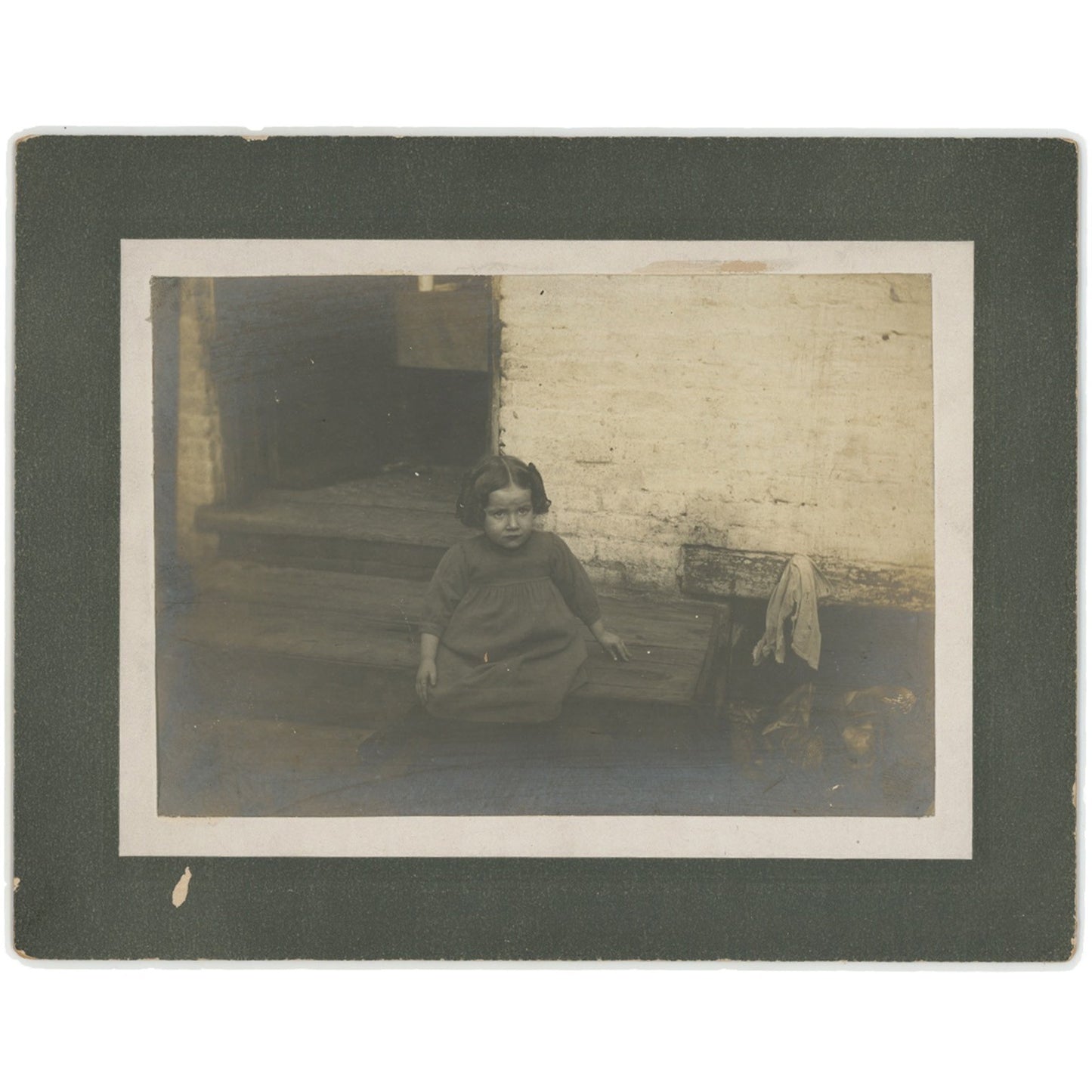 Vintage 5x7 photo: Little girl on wooden stairs, early 1900s, mounted with