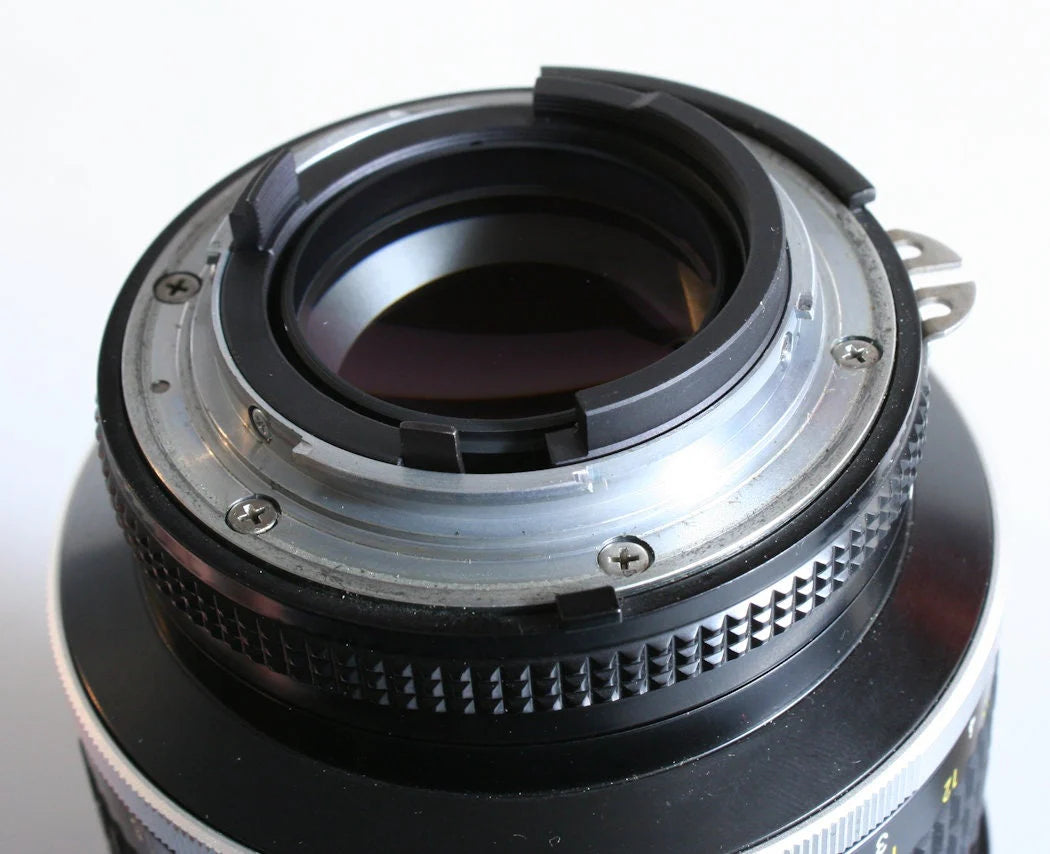 Nikon AI-S 135MM F2 Lens with Manual and UV filter with Front & Rear Caps