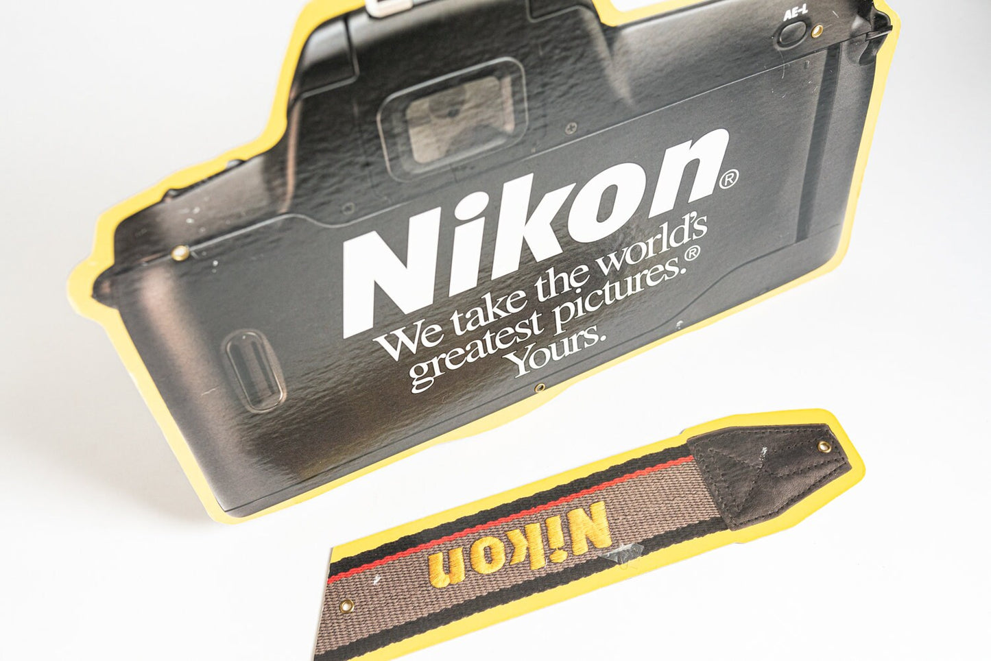Nikon Camera and Strap Sign